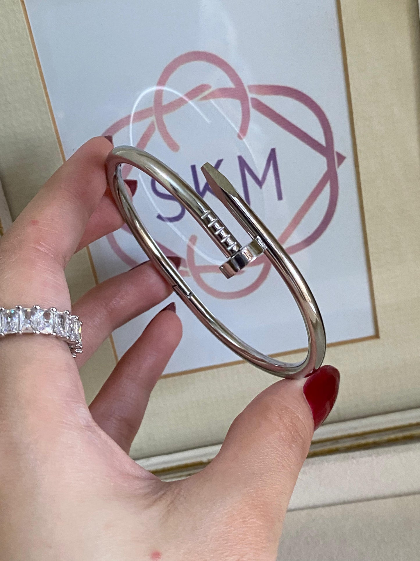 Silver nail handcuff