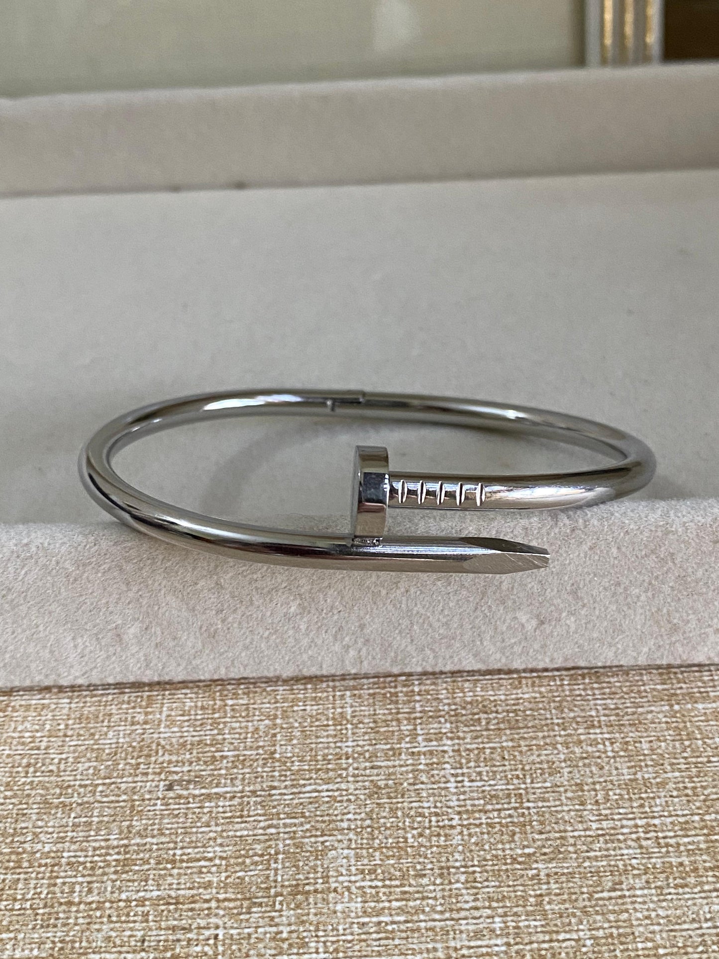 Silver nail handcuff