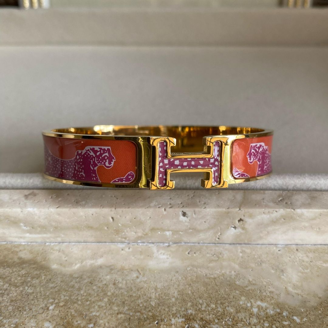 Orange H handcuff