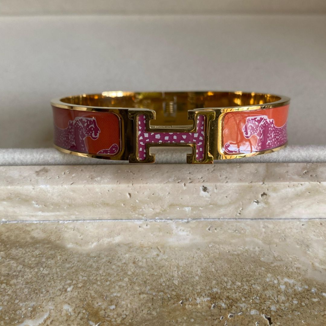 Orange H handcuff