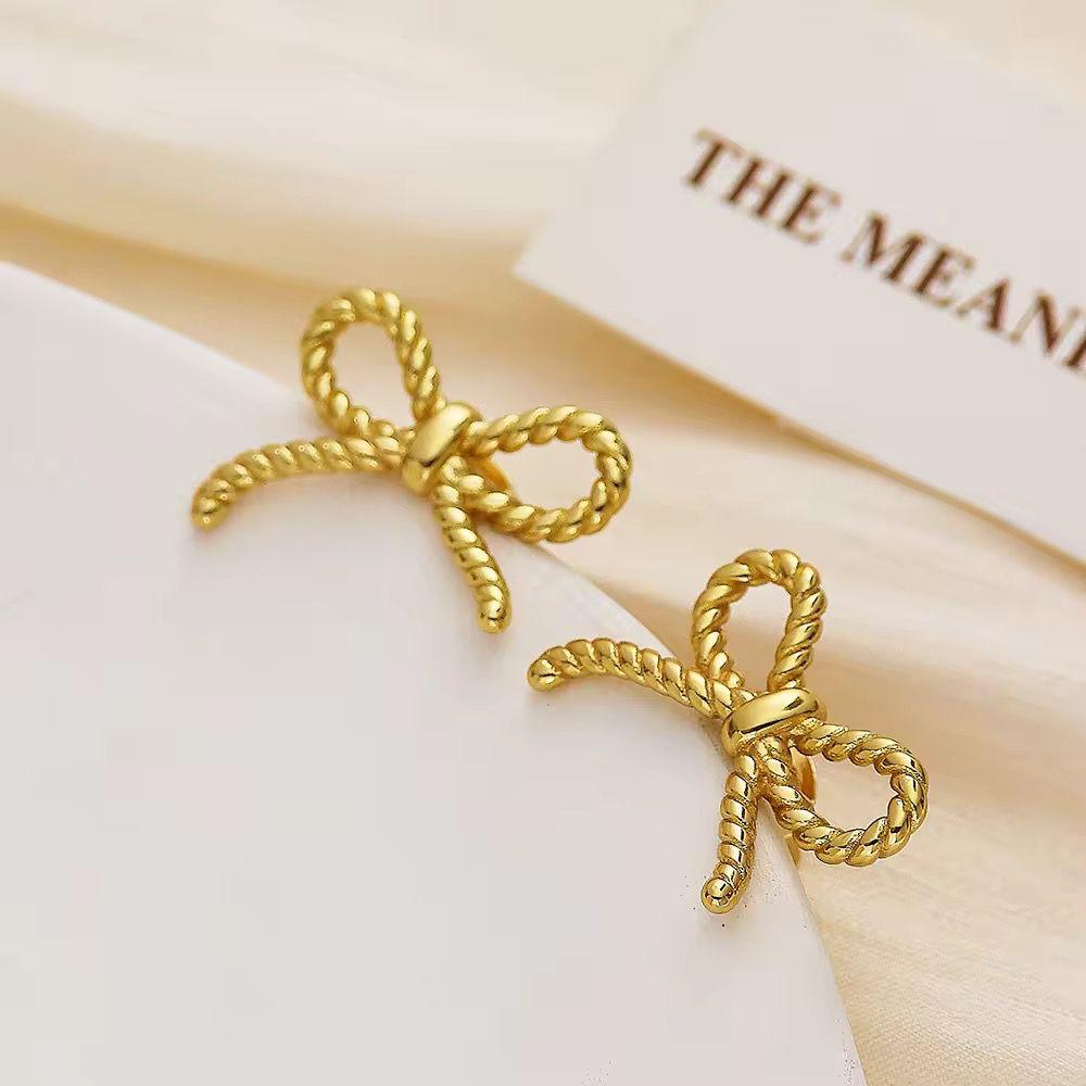 Thin bow earrings