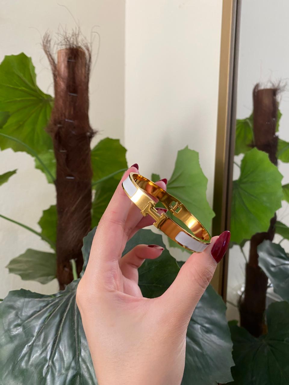 White H with Gold Logo Handcuff