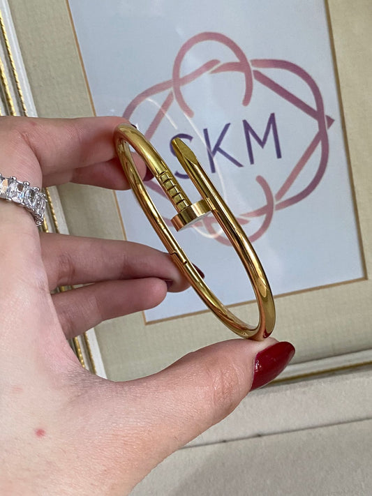Nail gold handcuff